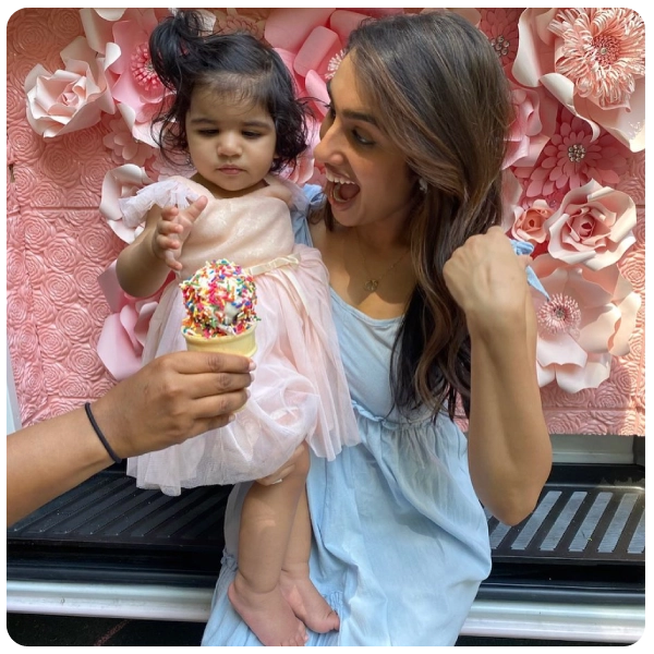 baby girl in light pink dress